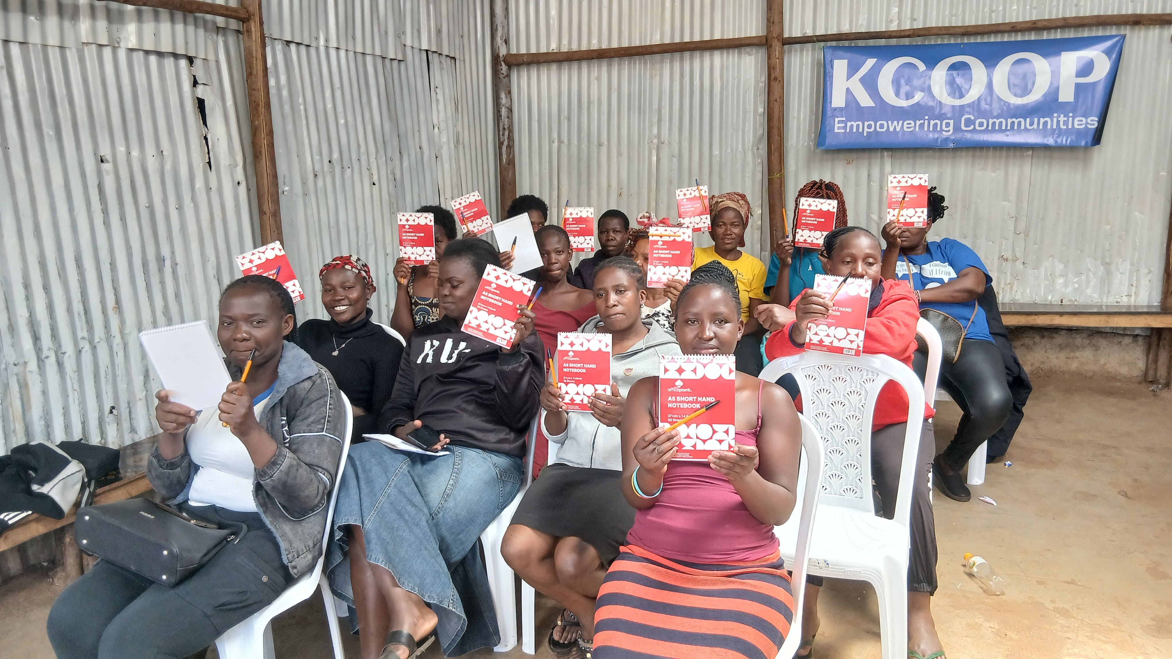 girls showing books donated